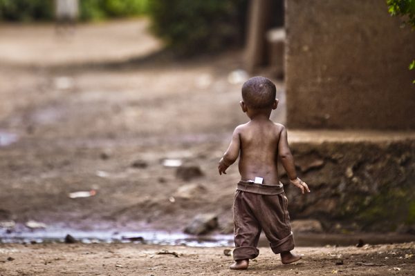 Orphan boy in an impoverished African village.